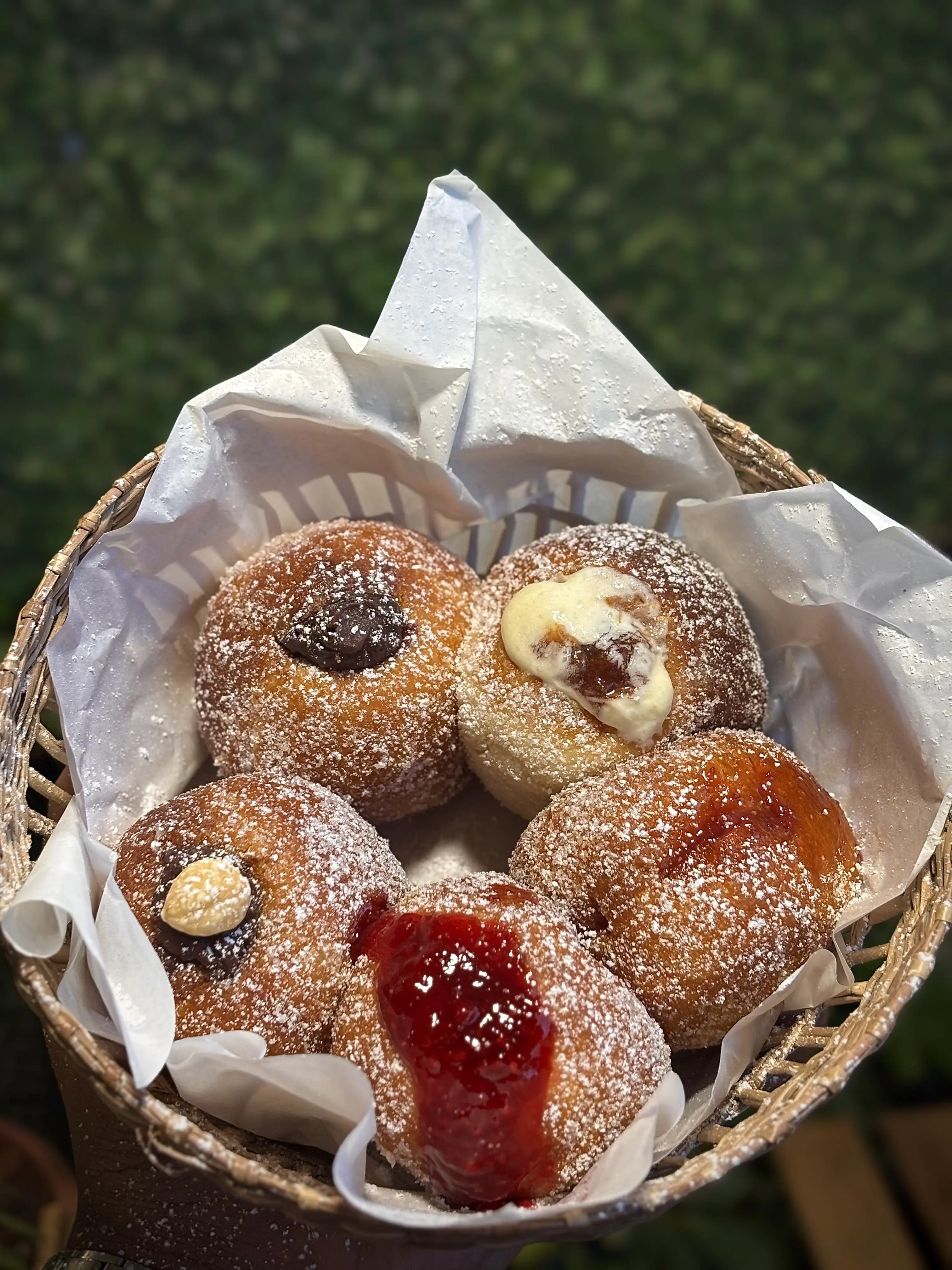Front counter with curated pastry display and warm lighting